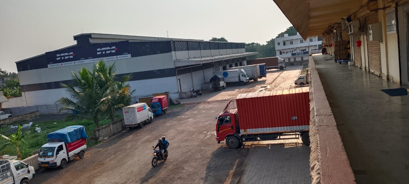 Loading dock with delivery trucks